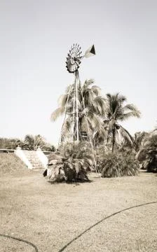 Vintage windmill on the field Stock Photos