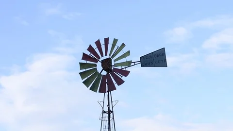 A vintage windmill spins with the wind. Selective focus video Stock Footage 84006452