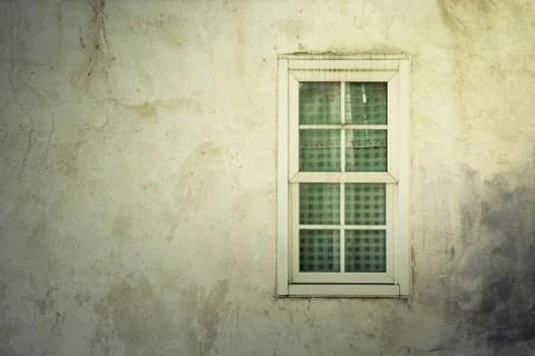 Vintage window on nice color cement wall 写真素材