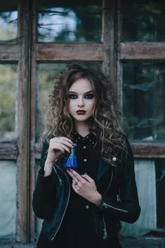 Vintage witch with elixir in hand Stock Photos