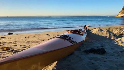 Vintage Wooden Kayak on the Beach, Cabillo Beach, CA Stock Footage