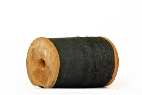 Vintage wooden thread spool on white background Stock Photos