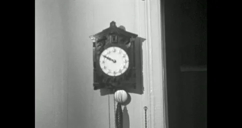 Vintage wooden wall clock with pendulum in a Soviet apartment Stock Footage 328451638