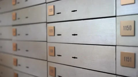 Vintage Yellow Safe Deposit Boxes in Bank Vault - Rows of Numbered Metal Lockers Stock Footage 331998152