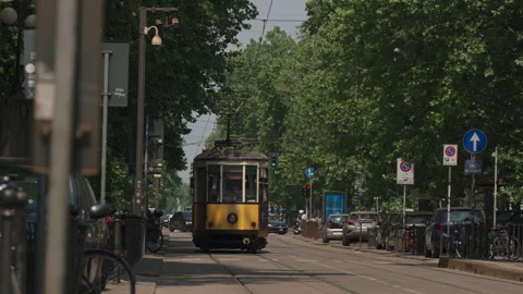 Vintage Yellow Tram Moving In Tree Lane Traffic Milan Milano Lombardy Italy Stock Footage 253982133