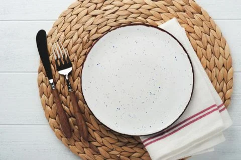 Vintage zero waste silverware. Rustic vintage set of white plate, wooden spoo Stock Photos