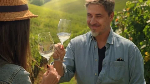 Vintner tasting wine in vineyard during vintage 库存影片 162682927