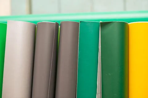 Vinyl car wrapping or plotter cutting sticker foil film rolls. Film colored i Stock Photos