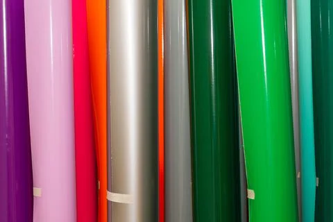 Vinyl car wrapping or plotter cutting sticker foil film rolls. Film colored i Stock Photos