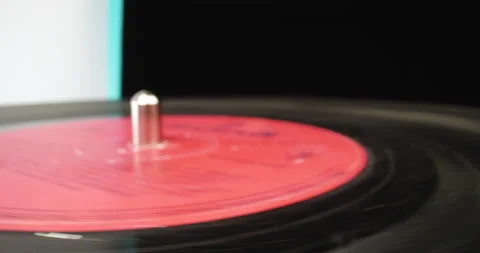 Vinyl disc on analog adapter, macro shot Stock Footage 146514966