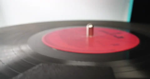 Vinyl disc on analog adapter, macro shot Stock Footage 146515013