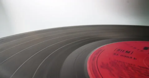 Vinyl disc on analog adapter, macro shot Stock Footage 146515148