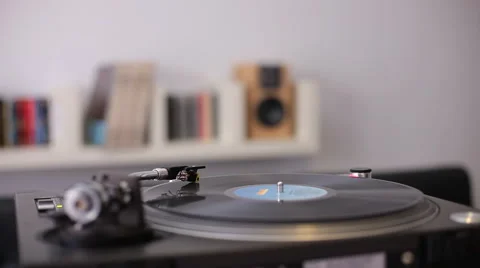 Vinyl disc turning on retro record player Stock Footage 58334656