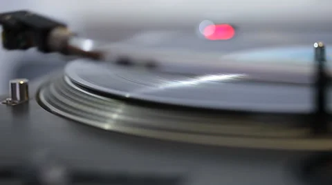 Vinyl disc turning on retro record player Stock Footage 58347337