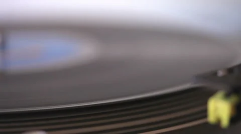 Vinyl disc turning on retro record player Stock Footage 58399412