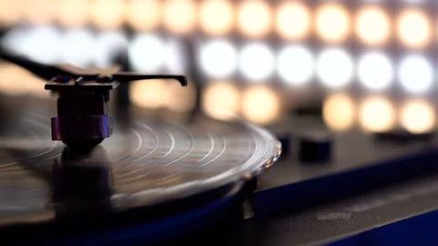 Vinyl disc turning on retro record player, close up Stock Footage 85356822