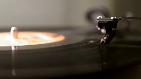 Vinyl lp record playing on a turntable isolated Stock Footage 101193039