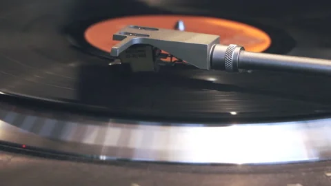 Vinyl is playing on turntable Video stock 96323751