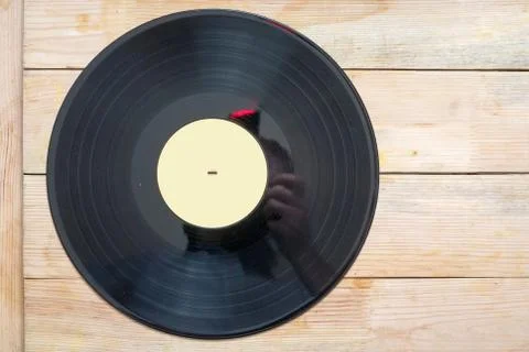 Vinyl record with copy space in front of a collection albums dummy titles Stock Photos