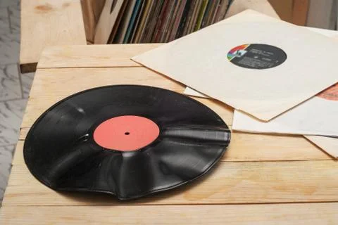 Vinyl record with copy space in front of a collection of albums dummy titles Stock Photos