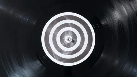 The vinyl record on DJ turntable record player close up. Black vinyl background Stock Footage 117593643