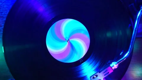 Vinyl Record Playback in Colorful Disco Lights, Top Down View Stock Footage 334780548