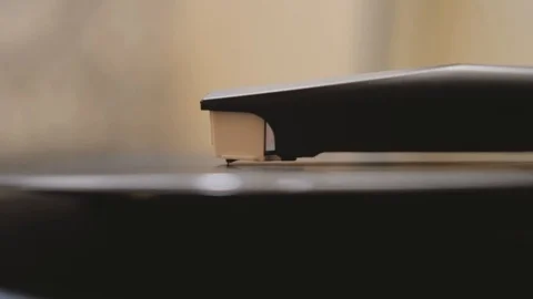 A vinyl record is played in the player Видео 124113973