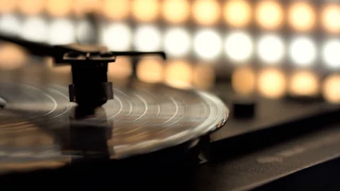 Vinyl record player, bright lights disco-bokeh Stock-Footage 85356678