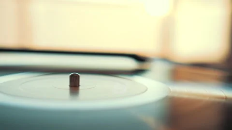 Vinyl record player needle pausing on white label Stock Footage 292924640
