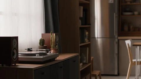 Vinyl Record Player Resting on Table in Modern Home for Relaxation Stock Footage 345509706