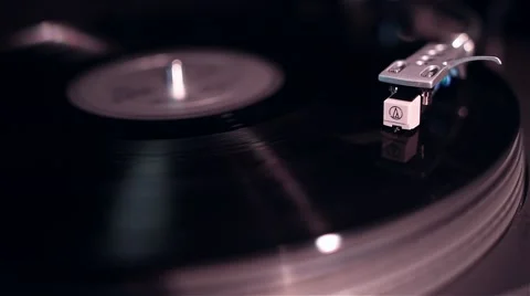 Vinyl record playing in turntable Stock Footage 57579662