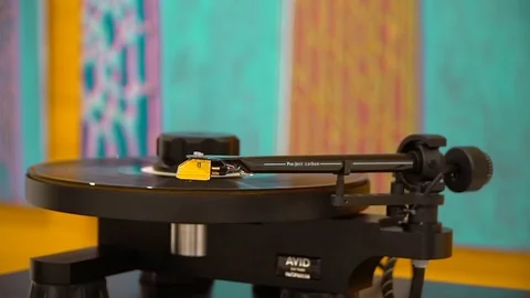 Vinyl record put on the player and run. it's spinning. Against the wall. Close Stock Footage 92165220