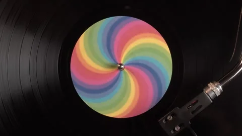 Vinyl Record With Rainbow Optical Illusion Sticker Spinning on Turntable, Top Stock Footage 335208157