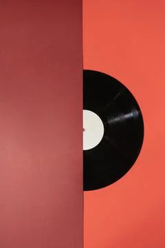 Vinyl record on a red background Stock Photos