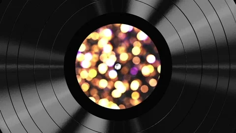 Vinyl record with shining light particles label looping 3D animation Video stock 164680306
