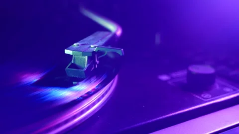 Vinyl record is spinning. Old retro turntable.Turntable stylus on a record Stock Footage 145183968