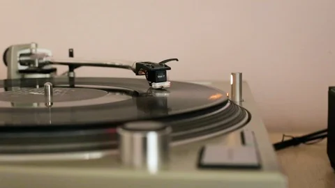 The vinyl record is spinning on the player (gramophone), dj installation Stock Footage 105548006