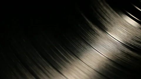 Vinyl record spinning on a record player's turntable Stock Footage