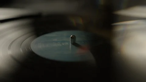 Vinyl record spinning on a turntable Stock Footage 129573537