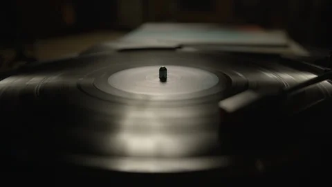 Vinyl record spinning on a turntable Stock Footage 129587469