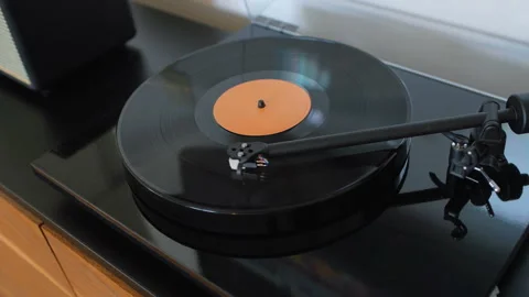 Vinyl record spinning on turntable Stock-Footage 331312474