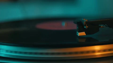 The vinyl record spins in the turntable2 Stock Footage 137900441
