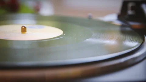 The vinyl record spins without a needle. Old turntable. Vintage Video stock 147151986