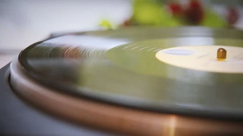 The vinyl record spins without a needle. Old turntable. Vintage Stock Footage 147152326