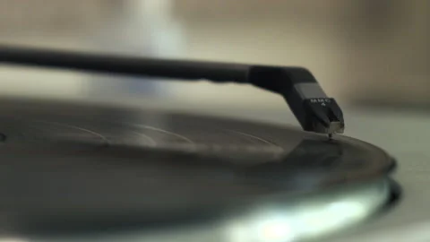 A Vinyl Record Starts Playing on a Record Player Stock Footage 130680331