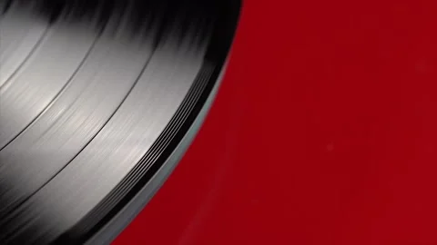 Vinyl Rotating on a Turntable, macro shot, the beautiful red lacquered body. Stock Footage 159370520