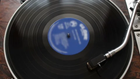Vinyl rotating on a turntable, top view Stock Footage 99042664
