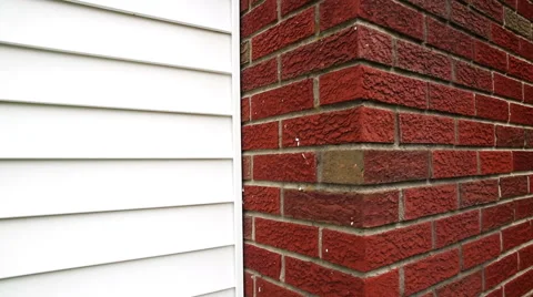 Vinyl Siding to Brick Chimney Stock Footage 57751004