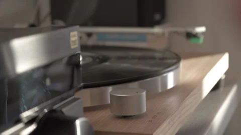 Vinyl Turntable Start Up and Tonearm Lowering Stock Footage 336548193