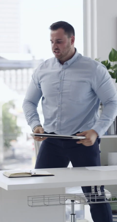 Violence, man and throw laptop in office for network glitch, market crash and Stock Footage 329665943